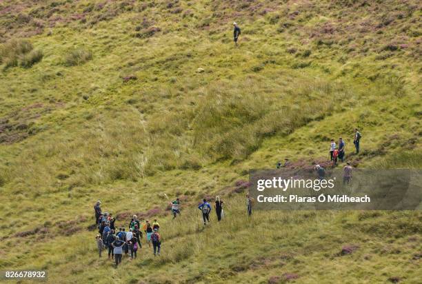 Louth , Ireland - 5 August 2017; Spectators and officials look on as Brendan Cummins of Tipperary takes a shot during the 2017 M Donnelly GAA...