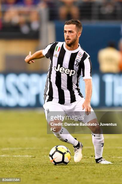 Miralem Pjanic of Juventus in action during the International Champions Cup match between Juventus and Barcelona at MetLife Stadium on July 22, 2017...