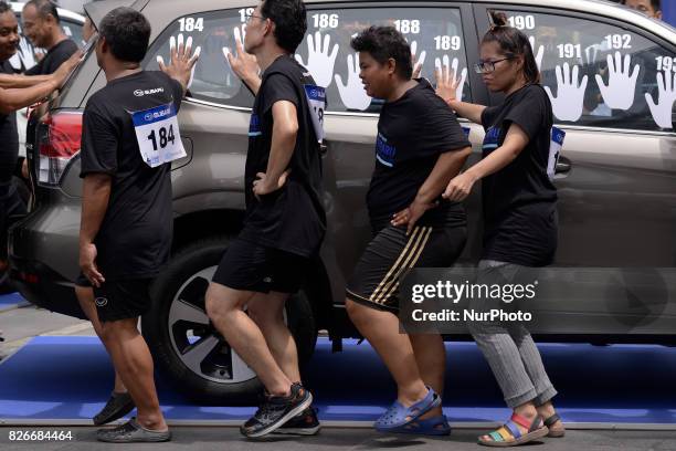 Competitors participate in the Subaru Palm Challenge Thailand 2017 in Bangkok, Thailand, on August 5, 2017. Subaru Palm Challenge Thailand 2017 at...