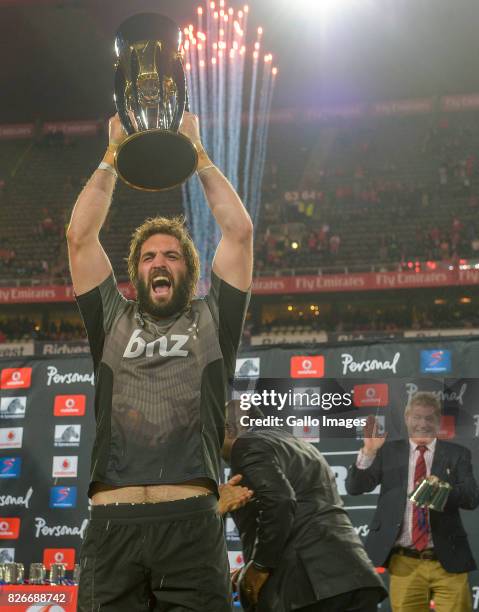 Captain Sam Whitelock of the Crusaders lifts the trophy as Crusaders are crowned the 2017 Super Rugby champions during the Super Rugby Final match...