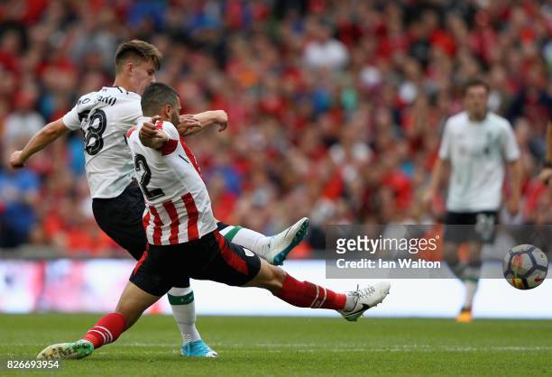 Ben Woodburn of Liverpool scores their teams second goal during the Pre Season Friendly match between Liverpool and Athletic Club at Aviva Stadium on...