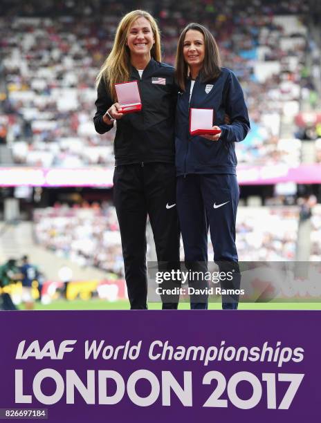 Kara Goucher of The United States and Jo Pavey of Great Britain recieve their reallocated medals from the 10,000m Women race at the Osaka 2007...