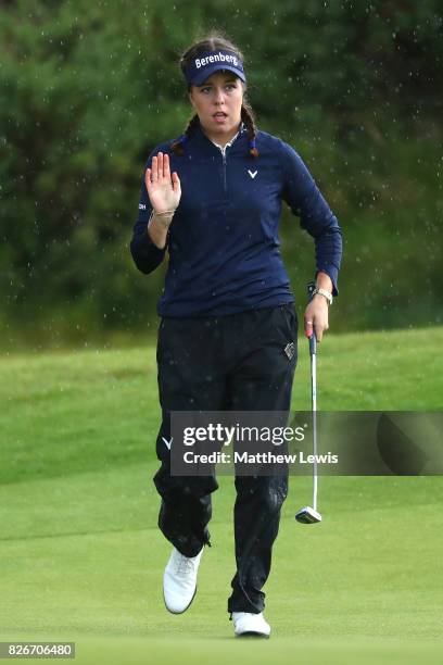 Georgia Hall of England acknowledges the crowd on the 15th green during the third round of the Ricoh Women's British Open at Kingsbarns Golf Links on...