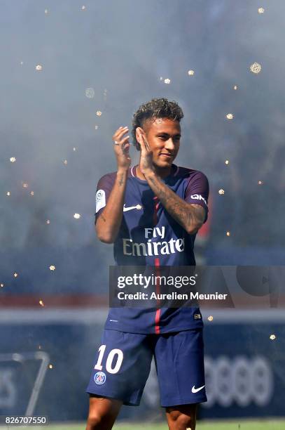 Neymar of Paris Saint-Germain reacts as he is presented to the fans before the Ligue 1 match between Paris Saint-Germain and Amiens at Parc des...