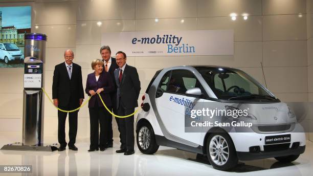 German Chancellor Angela Merkel, Daimler head Juergen Zetsche , Juergen Grossmann , CEO of German power supplier RWE, and Matthias Wissmann, Chairman...