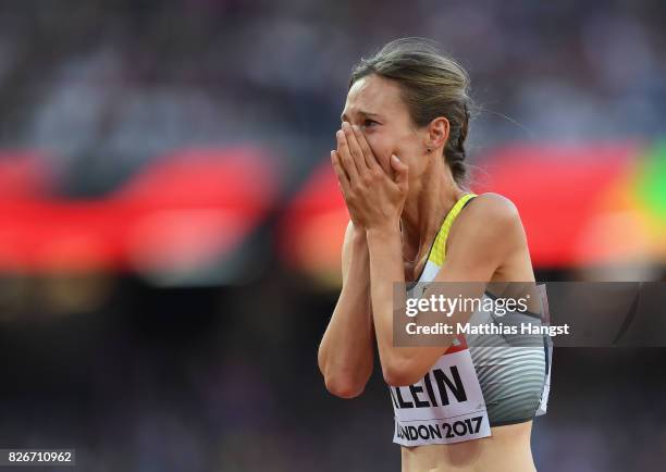 Hanna Klein of Germany holds her head in her hands following the semi final of the Women's 1500 metres during day two of the 16th IAAF World...