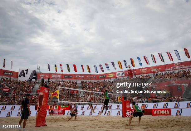 Evandro of Brazil blocked Ben Saxton of Canada during the Men's Quarter-final match between Canada and Brazil on August 05, 2017 in Vienna, Austria.