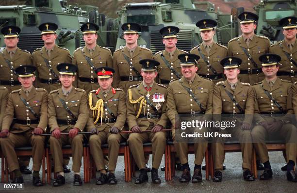 Britain's Prince Charles, bottom row center, a colonel in the Welsh Guards, poses for a group photograph with the 1st Battalion Welsh Guards during...