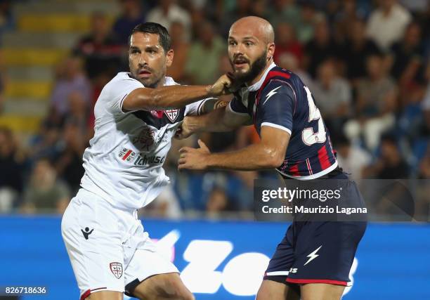 Arlind Ajeti of Crotone competes for the ball with Marco Borriello of Cagliari during the Pre-Season Friendly match between FC Crotone and Cagliari...