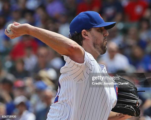 Starting pitcher John Lackey of the Chicago Cubs delivers the ball against the Washington Nationals at Wrigley Field on August 5, 2017 in Chicago,...