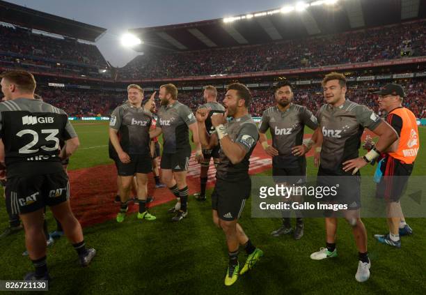 Crusaders players celebrate at the end of the Super Rugby Final match between Emirates Lions and Crusaders at Emirates Airline Park on August 05,...