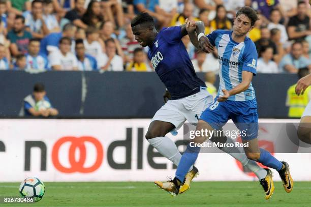 Balde Diao Keita of SS Lazio compete for the ball with Mula of Malaga CF during the Pre-Season Friendly match between Malaga CF and SS Lazio at...