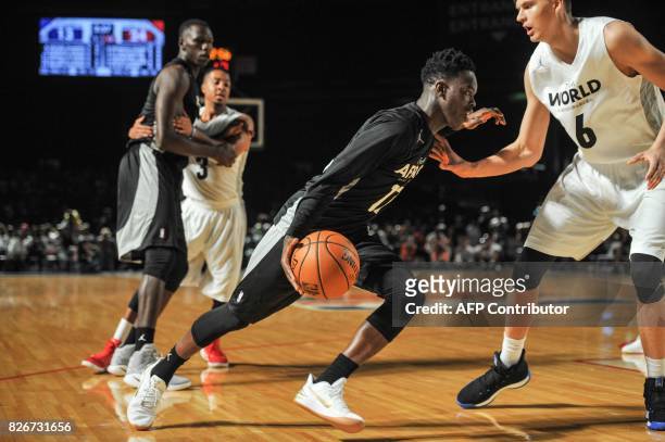 Player Bismack Biyombo from the Charlotte Bobcats vies during the NBA Africa Game 2017 basketball match between Team Africa and Team World on August...