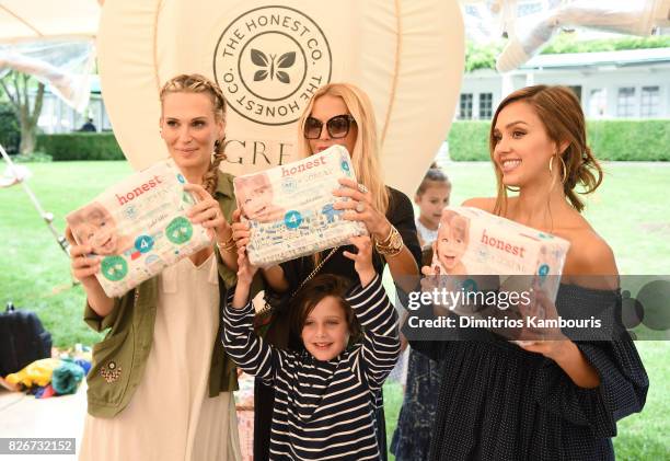 Model Molly Sims, designer Rachel Zoe, and Founder of The Honest Company and Honest Beauty Jessica Alba attend as the Honest Company and The GREAT....