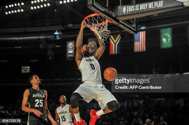 Player Andre Drummond from the Detriot Pistons slam dunks during the NBA Africa Game 2017 basketball match between Team Africa and Team World on...