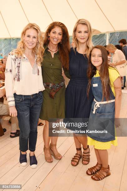 Dylan Lauren and Kelly Sawyer pose with guests as the Honest Company and The GREAT. Celebrate The GREAT Adventure on August 5, 2017 in East Hampton,...