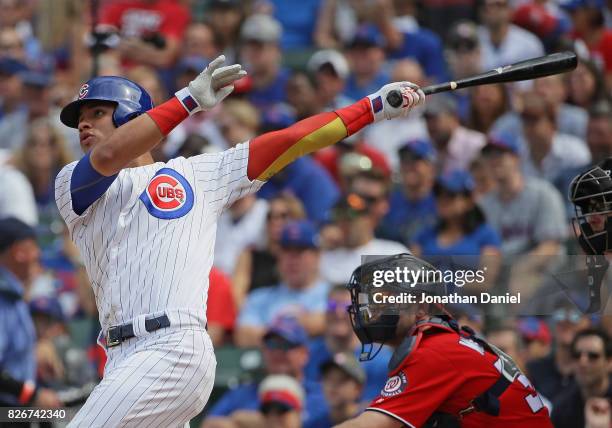 Willson Contreras of the Chicago Cubs hits a two run home run in the 6th inning against the Washington Nationals at Wrigley Field on August 5, 2017...