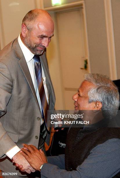 Bangladeshi banker and economist Muhammad Yunus, Nobel Peace Prize Laureate is greeted by Norwegian minister of Labour and Social Inclusion, Dag...