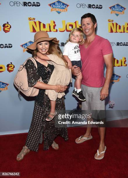 Actress Beverley Mitchell, her husband Michael Cameron and their children Kenzie Cameron and Hutton Cameron arrive at the premiere of Open Road...