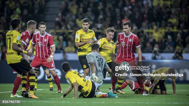 Goalkeeper Roman Buerki of Dortmund scores an own net goal during the DFL Supercup 2017 match between Borussia Dortmund and Bayern Muenchen at Signal...