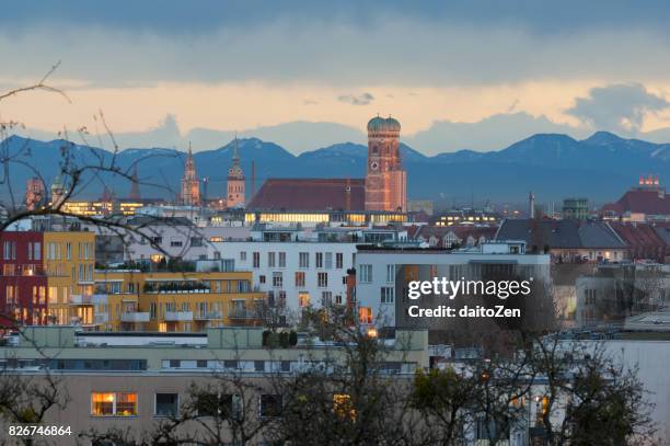 munich skyline with frauenkirche cathedral and alps mountain range in the background, munich, bavaria, germany. - munich cityscape stock pictures, royalty-free photos & images