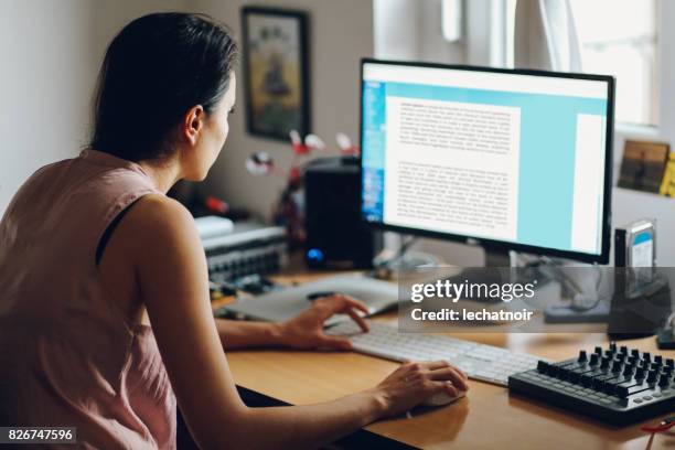 woman working in a home apartment workstudio - mixing stock pictures, royalty-free photos & images
