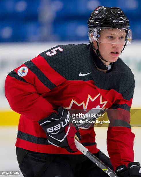 Dennis Cholowski of Canada skates up ice against Finland during a World Jr. Summer Showcase game at USA Hockey Arena on August 2, 2017 in Plymouth,...
