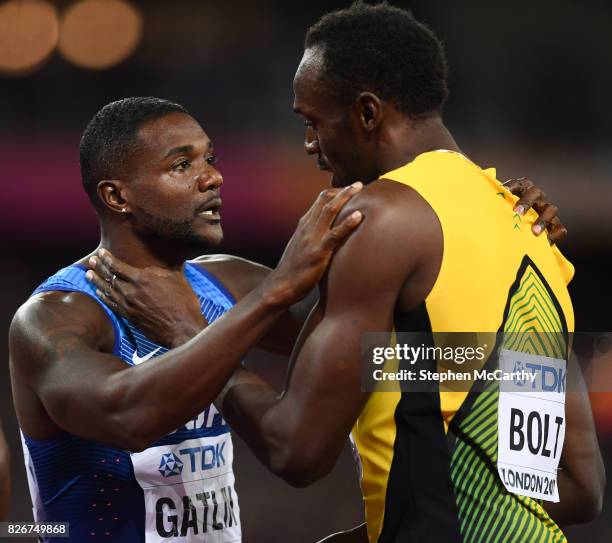 London , United Kingdom - 5 August 2017; Justin Gatlin of the USA, left, is congratulated by third place Usain Bolt of Jamaica after winning the...