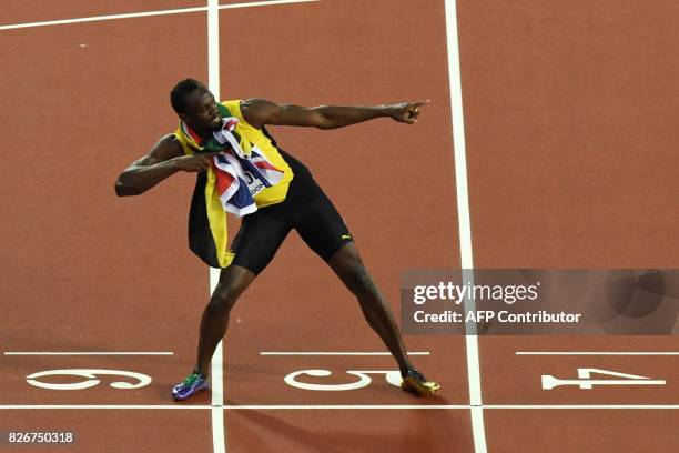 Jamaica's Usain Bolt poses after taking the third place in the men's 100m athletics event at the 2017 IAAF World Championships at the London Stadium...