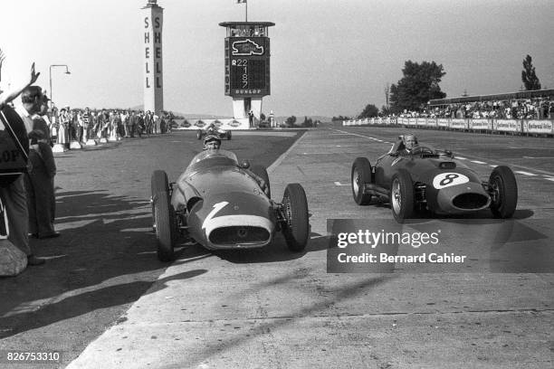 Juan Manuel Fangio, Mike Hawthorn, Maserati 250F, Ferrari 801, Grand Prix of Germany, Nurburgring, 04 August 1957. The finish of the greatest race in...