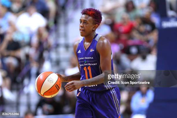Phoenix Mercury guard Danielle Robinson brings the ball up court during the second half of an WNBA game between Phoenix Mercury and Connecticut Sun...