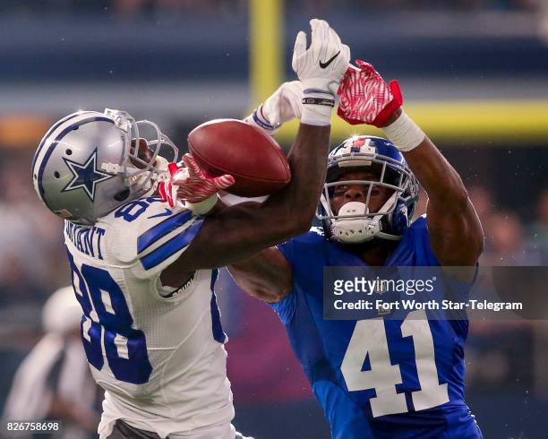 New York Giants cornerback Dominique Rodgers-Cromartie breaks up a pass intended for Dallas Cowboys wide receiver Dez Bryant on September 11 at AT&T...