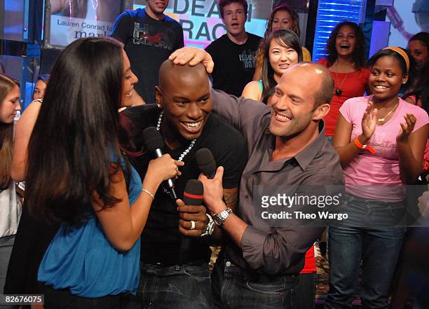 Natalie Martinez, Tyrese Gibson andJason Statham of the movie 'Death Race' visit MTV's "TRL" at MTV studios on August 19, 2008 in New York City.