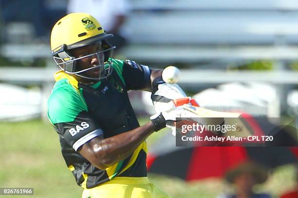 In this handout image provided by CPL T20, Rovman Powell of the Jamaica Tallawahs miscues shot during Match 3 of the 2017 Hero Caribbean Premier...