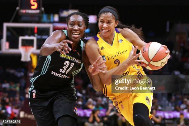 Candace Parker of the Los Angeles Sparks handles the ball against Tina Charles of the New York Liberty during a WNBA basketball game at Staples...