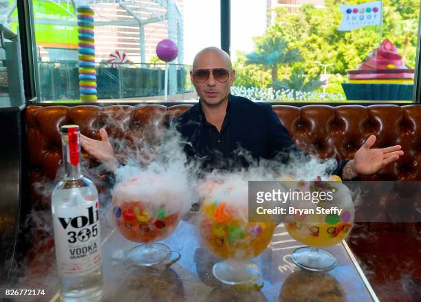 Grammy award winning artist Pitbull debuts his creations the 'Watermelon Patch ', the 'Fuzzy Peach Penguin Mango ' and the 'Hot & Wild Spicy 305...