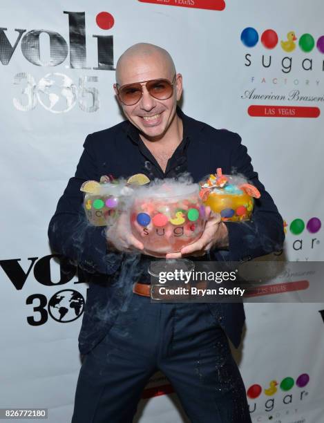 Grammy award winning artist Pitbull debuts his creations the Hot & Wild Spicy 305 Pineapple ' the 'Watermelon Patch ' and the 'Fuzzy Peach Penguin...