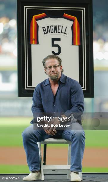 Hall of Famer Jeff Bagwell speaks to the fans during a pre-game ceremony celebrating his induction into the National Baseball Hall of Fame before...