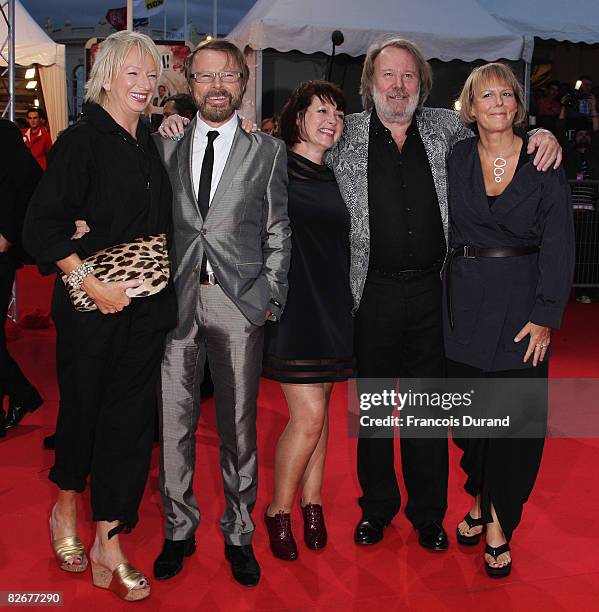 Bjorn Ulvaeus and Benny Anderson of the Swedish group Abba pose with British playwrier Catherine Johnson , producer Judy Cramer , and director...