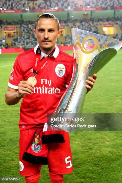 Benfica's midfielder Ljubomir Fejsa from Serbia with Portuguese Super Cup trophy after the match between SL Benfica and VSC Guimaraes at Estadio...