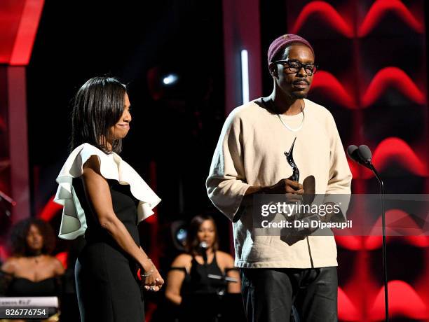 Honoree Suzanne Schank accepts her award from Wood Harris during Black Girls Rock! 2017 at NJPAC on August 5, 2017 in Newark, New Jersey.