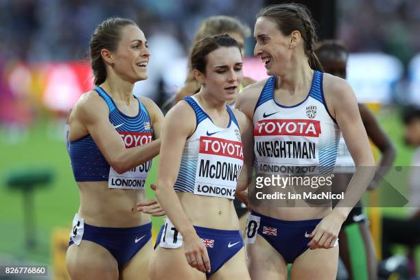 Laura Weightman of Great Britain reacts with Jennifer Simpson of United States in the Women's 15000m semi final during day two of the 16th IAAF World...