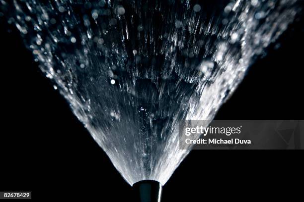 liquid erupting from a bottle - water sprayer stock pictures, royalty-free photos & images