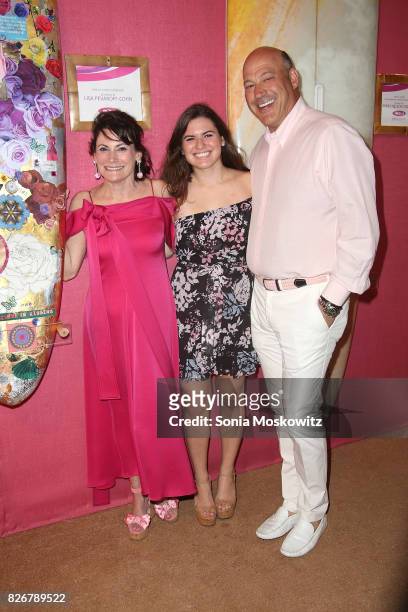 Lisa Pevaroff-Cohn, Chloe Cohn, and Gary Cohn attend the Hamptons Paddle & Party for Pink on August 5, 2017 at Fairview on Mecox Bay, Bridgehampton,...