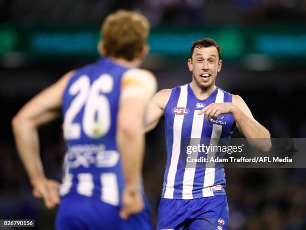 Todd Goldstein of the Kangaroos chats to Daniel Nielson of the Kangaroos during the 2017 AFL round 20 match between the North Melbourne Kangaroos and...