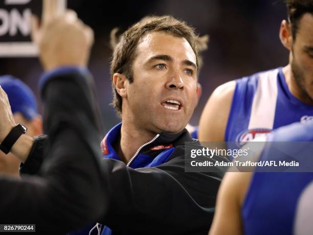 Brad Scott, Senior Coach of the Kangaroos addresses his players during the 2017 AFL round 20 match between the North Melbourne Kangaroos and the...