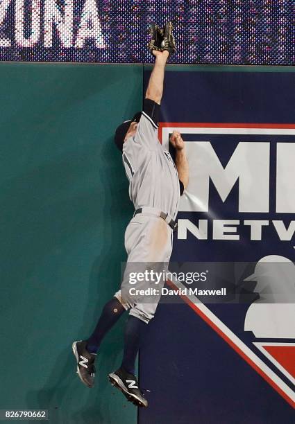 Brett Gardner of the New York Yankees catches a ball hit by Jose Ramirez in the ninth inning at Progressive Field on August 5, 2017 in Cleveland,...