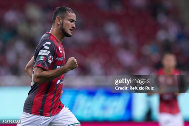 Carlos Gonzalez of Necaxa celebrates after scoring the first goal of his team during the third round match between Chivas and Necaxa as part of the...