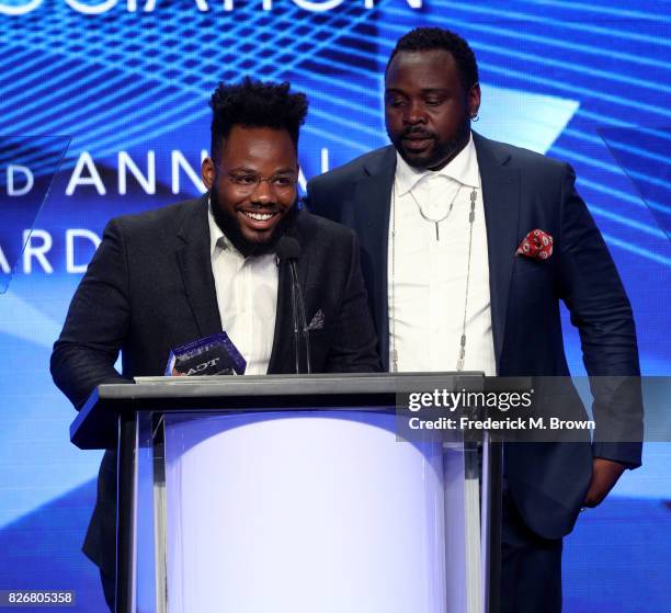 Writer Stephen Glover and actor Brian Tyree Henry accept the award for 'Individual Achievement in Comedy' on behalf of Donald Glover for 'Atlanta'...