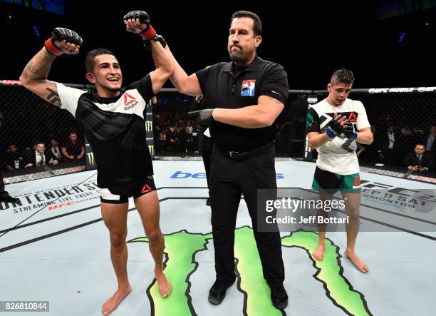 Sergio Pettis celebrates his victory over Brandon Moreno of Mexico in their flyweight bout during the UFC Fight Night event at Arena Ciudad de Mexico...